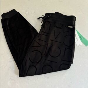 Calvin Klein Women’s Plush Joggers with Logo Design, PLX